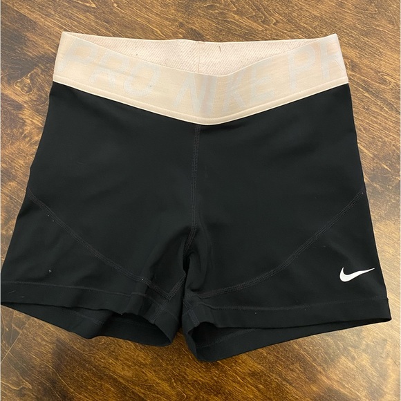 Nike pro dri-fit shorts, with light pink band. - Picture 1 of 3